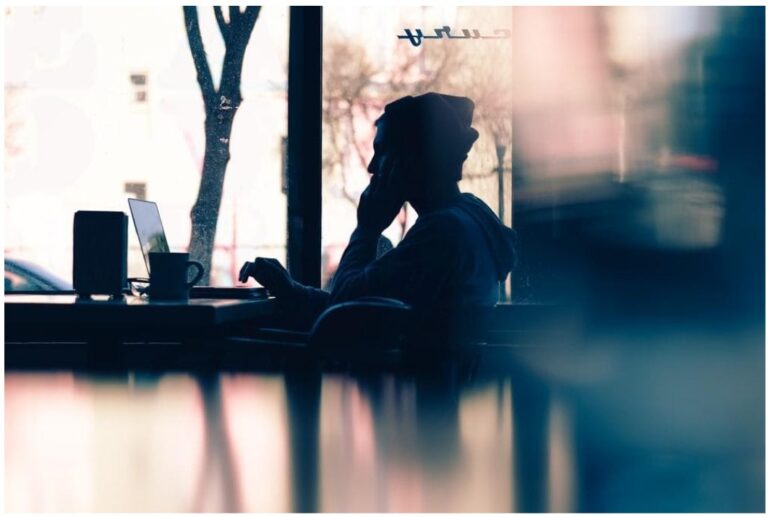 work from home laptop coffee mug disk coffee shop man