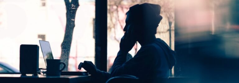 young man working on laptop computer