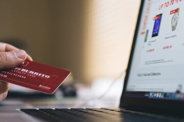 ecommerce - credit card infront of computer