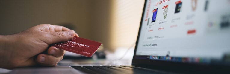 ecommerce - credit card infront of computer